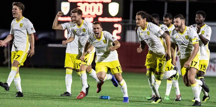 New Mexico United celebrates their penalty kick victory over the Denver Rapids MLS team